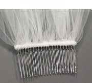 Two-layer pearl beaded bridal veil with Korean style metal hair comb on soft chiffon tulle background
