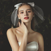 Pearl beaded bow bridal veil made of soft chiffon tulle and delicate mesh, lightweight and elegant wedding headpiece
