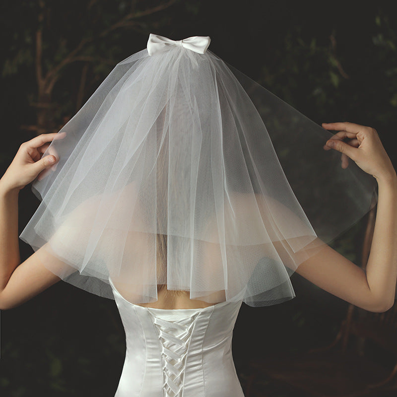 Ivory bridal veil and headpiece set made of soft chiffon tulle for wedding ceremonies