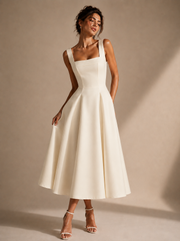 Ivory Sculpted Midi Dress - Architectural Elegance in Motion