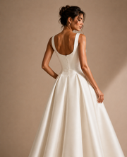 Ivory Sculpted Midi Dress - Architectural Elegance in Motion