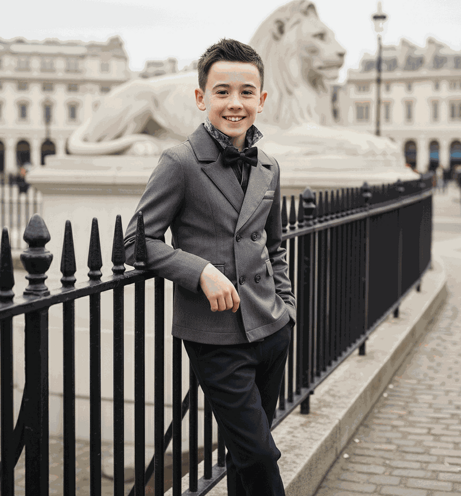 Boys formal blazer for school uniform and special occasions, ages 3-12, classic tailored design in navy blue.