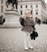 Girls black wool cape coat in baby doll style for winter ages 4 to 7 years