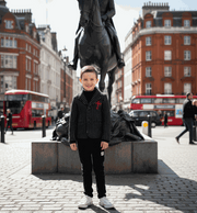 Boy wearing black wool blazer vintage style winter jacket for kids aged 3-9 years