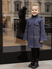 Girl wearing a double-breasted high-neck autumn winter coat for ages 3-10