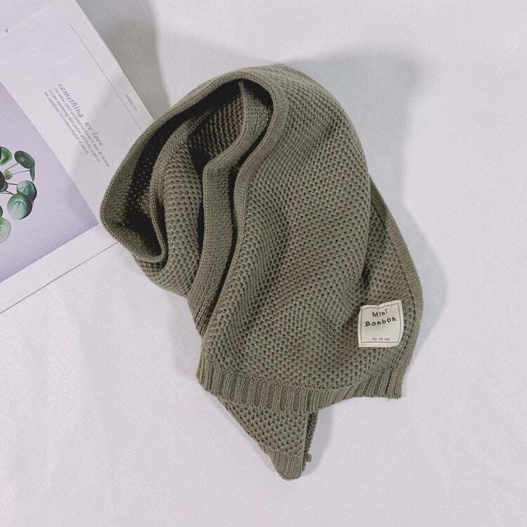 Kids wearing soft, thick knitted winter scarves for boys and girls aged 3-14 years