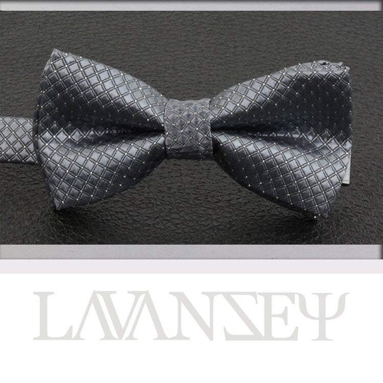 Boys pre-tied bow tie in classic fancy pattern for weddings and parties