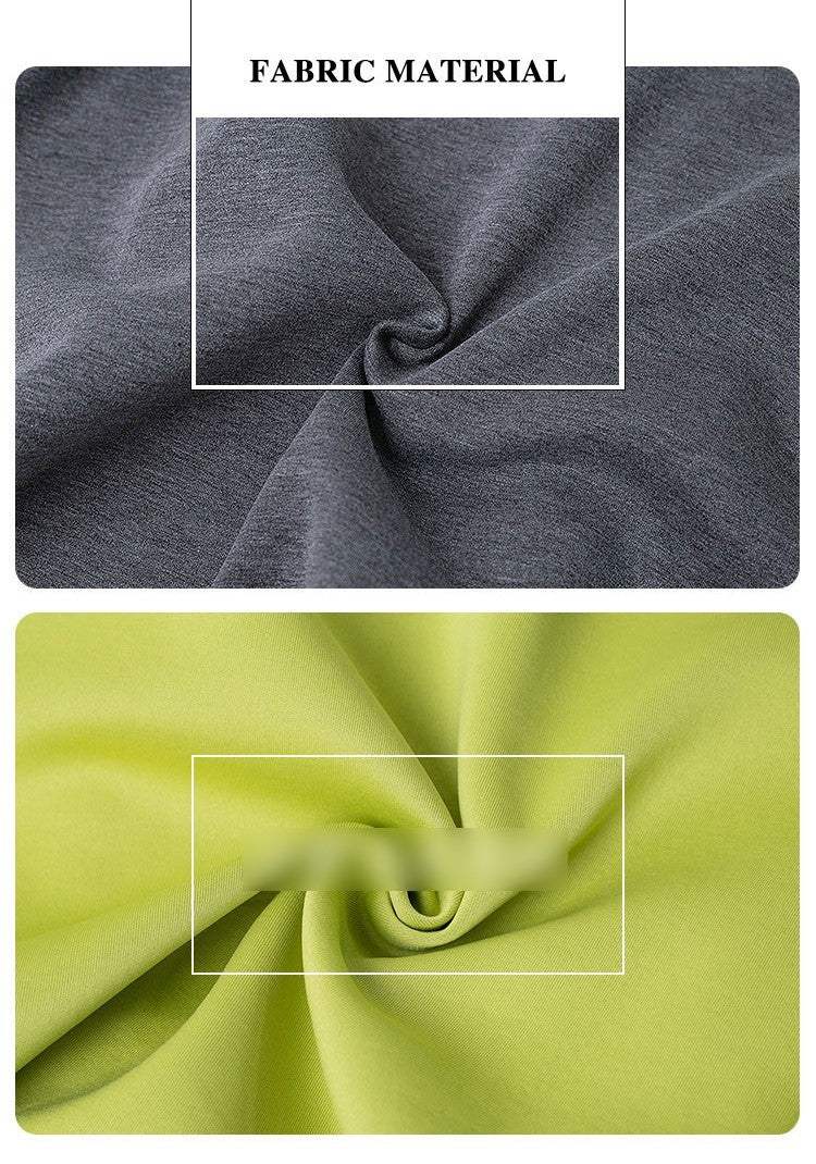 Girl wearing apple green cape flower girl dress with black bow and button-front design