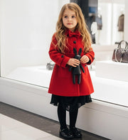 Girl wearing elegant red cashmere long coat with black bow for autumn winter wear ages 3-5 years