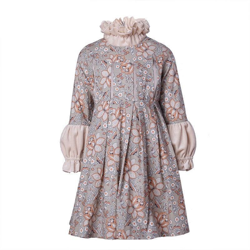 Girl wearing floral vintage A-line dress for special occasions and weddings