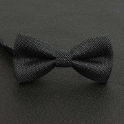 Boys pre-tied bow tie in classic fancy pattern for weddings and parties