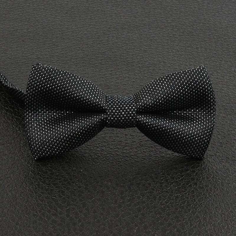 Boys pre-tied bow tie in classic fancy pattern for weddings and parties