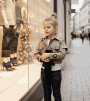 Girl wearing a stylish windproof cotton trench coat for ages 4-14 years