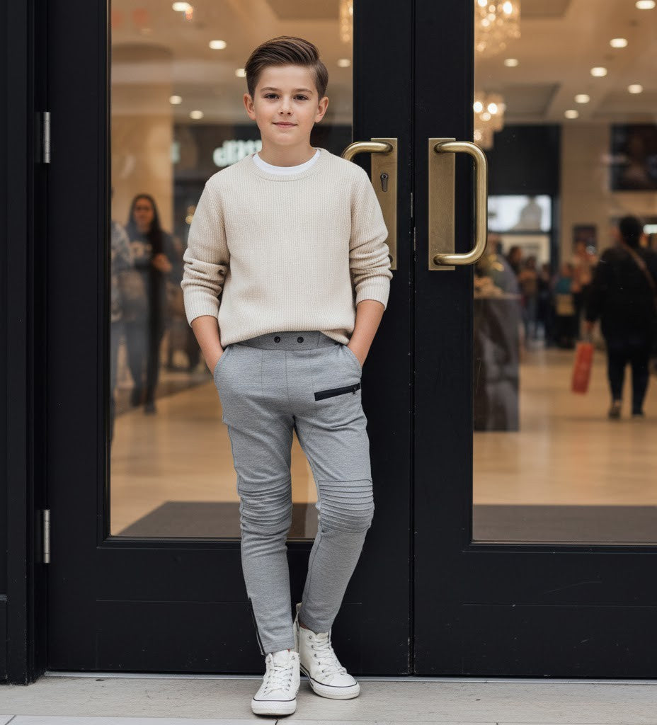 Boys slim fit gray stretch knit pants for ages 4-12 with elastic waistband and tapered leg