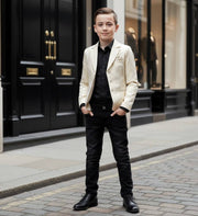 Boy wearing a tailored gold jacquard blazer for formal occasions aged 8-12