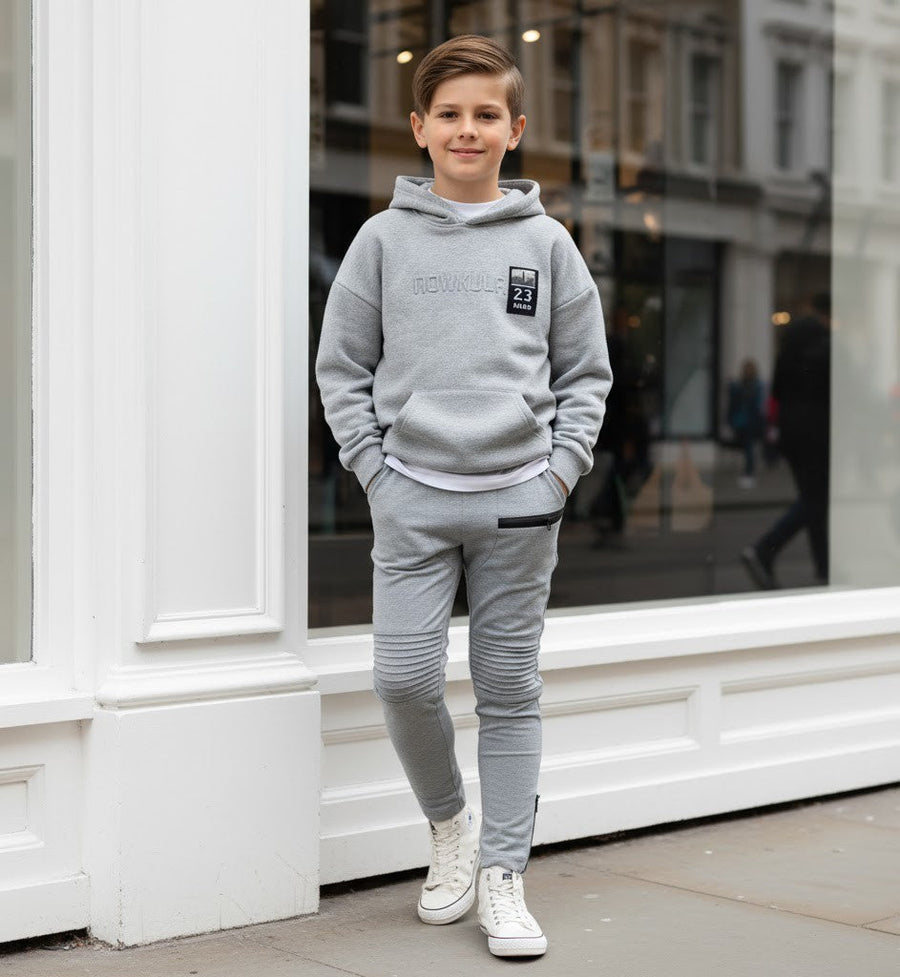 Gray boys slim fit knit pants for ages 4-12 with stretch fabric and elastic waistband