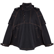 Boy wearing black deluxe superhero cape coat for kids aged 3-5 years outdoors winter costume