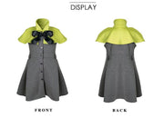Apple green cape flower girl dress with black bow and button front for girls aged 9–12