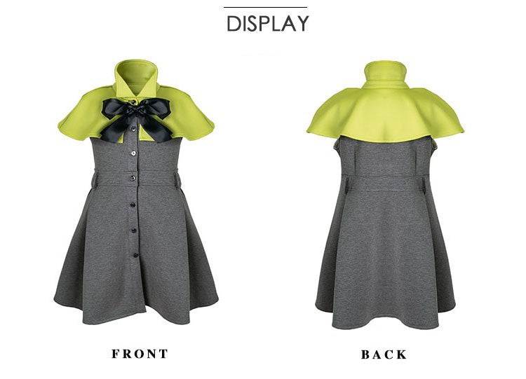 Apple green cape flower girl dress with black bow and button front for girls aged 9–12