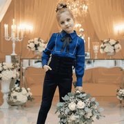 Child wearing kids high waist denim jeggings in a casual outdoor setting