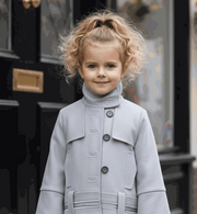 Girl wearing blue high-neck autumn winter coat with double-breasted design for ages 3-10 years
