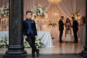 Boys navy velvet tuxedo blazer with satin lapel and slim fit for formal occasions ages 3-7