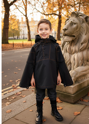 Boy wearing black deluxe superhero cape for kids winter costume ages 3-5