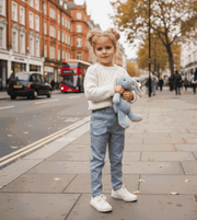 Girls wearing light blue stretchy denim skinny jeans for kids aged 4-9 years