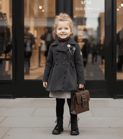 Toddler girl wearing a warm long plaid wool-blend winter coat with button closure