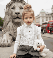 Girl wearing vintage lace vest sleeveless long cardigan in white, suitable for ages 3-12 years, styled for layered outfit