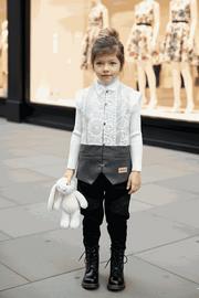 Girl wearing a long vintage lace sleeveless vest cardigan, perfect for layering ages 3-12 years