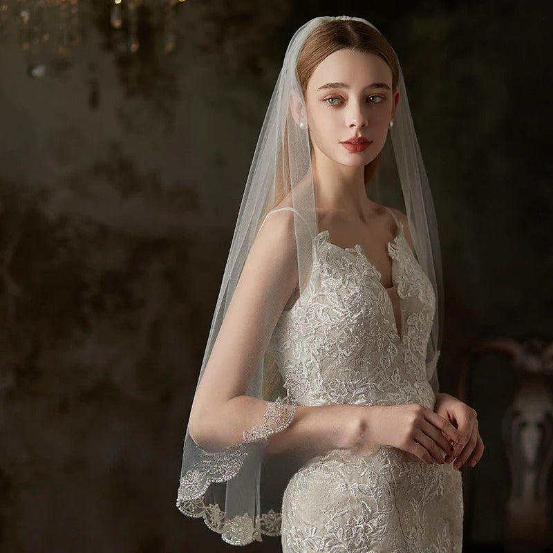 Embroidered soft tulle bridal veil in pure white with delicate fairy forest style embroidery