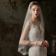 Embroidered soft tulle bridal veil in pure white with delicate fairy forest style embroidery