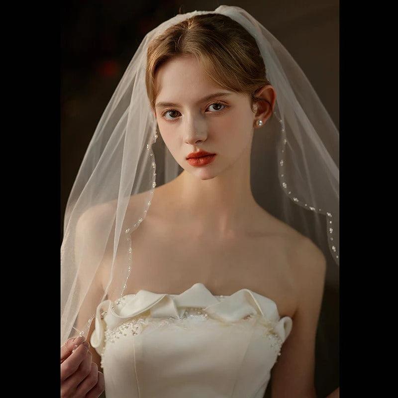 Soft tulle lace trim bridal veil with comb, mid-length wedding headpiece