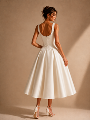 Ivory Sculpted Midi Dress - Architectural Elegance in Motion
