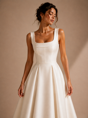 Ivory Sculpted Midi Dress - Architectural Elegance in Motion