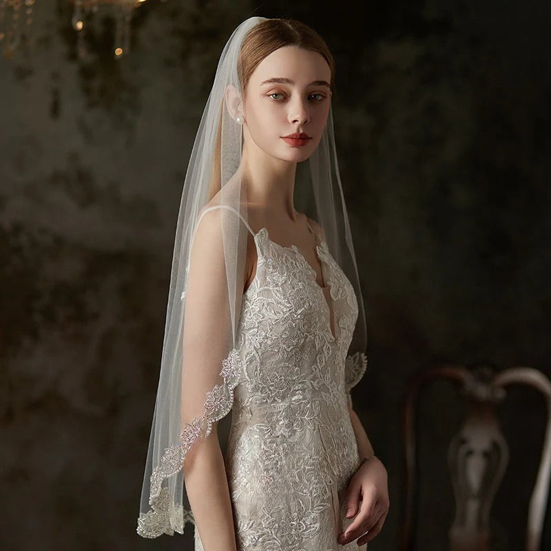 Embroidered soft tulle bridal veil in pure white mid-long fairy forest style