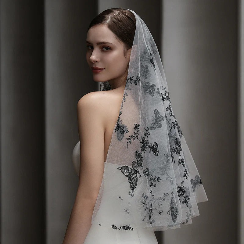 Black Butterfly Bridal Veil made of soft chiffon tulle for vintage dark cosplay and editorial wedding looks