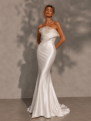Ivory sculpted satin mermaid wedding guest dress with organza folded bust and floor-sweeping train