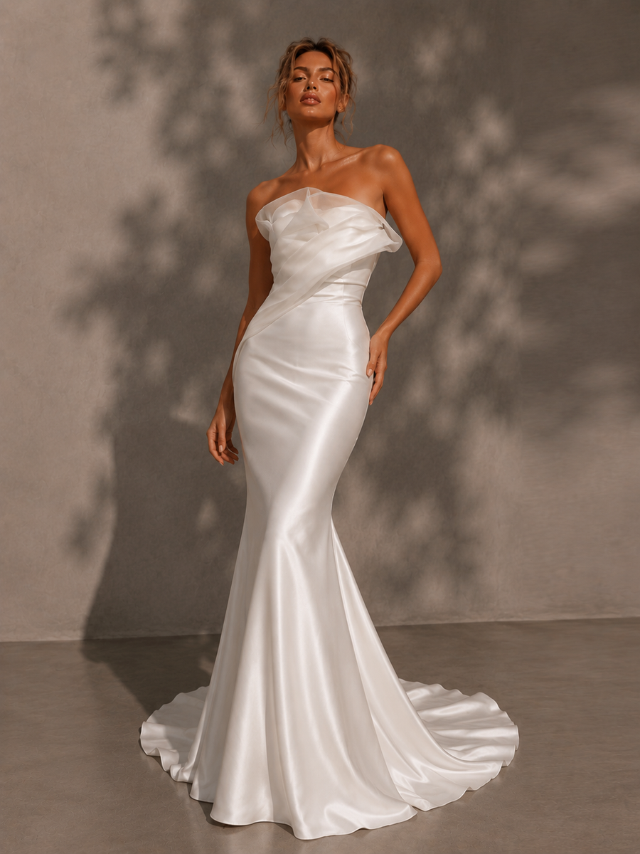 Ivory sculpted satin mermaid wedding dress with organza folded bust and floor-sweeping train