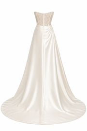 Strapless ivory satin draped wedding dress with lace corset and cathedral train