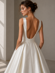 Ivory satin princess dress with square neckline and open back bridal gown