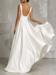 Ivory satin princess dress with square neckline and open back bridal gown