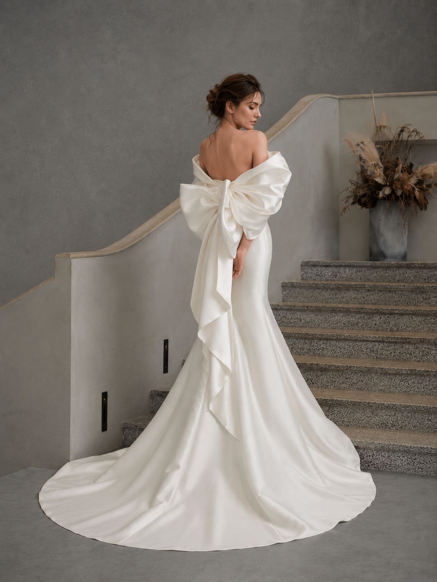Ivory Sculpted Bow Mermaid Wedding Gown - Off Shoulder Couture Satin Bridal Dress with Dramatic Back Statement