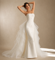 Ivory pearl satin formal wedding guest dress with sculpted floral appliqué and detachable tulle train