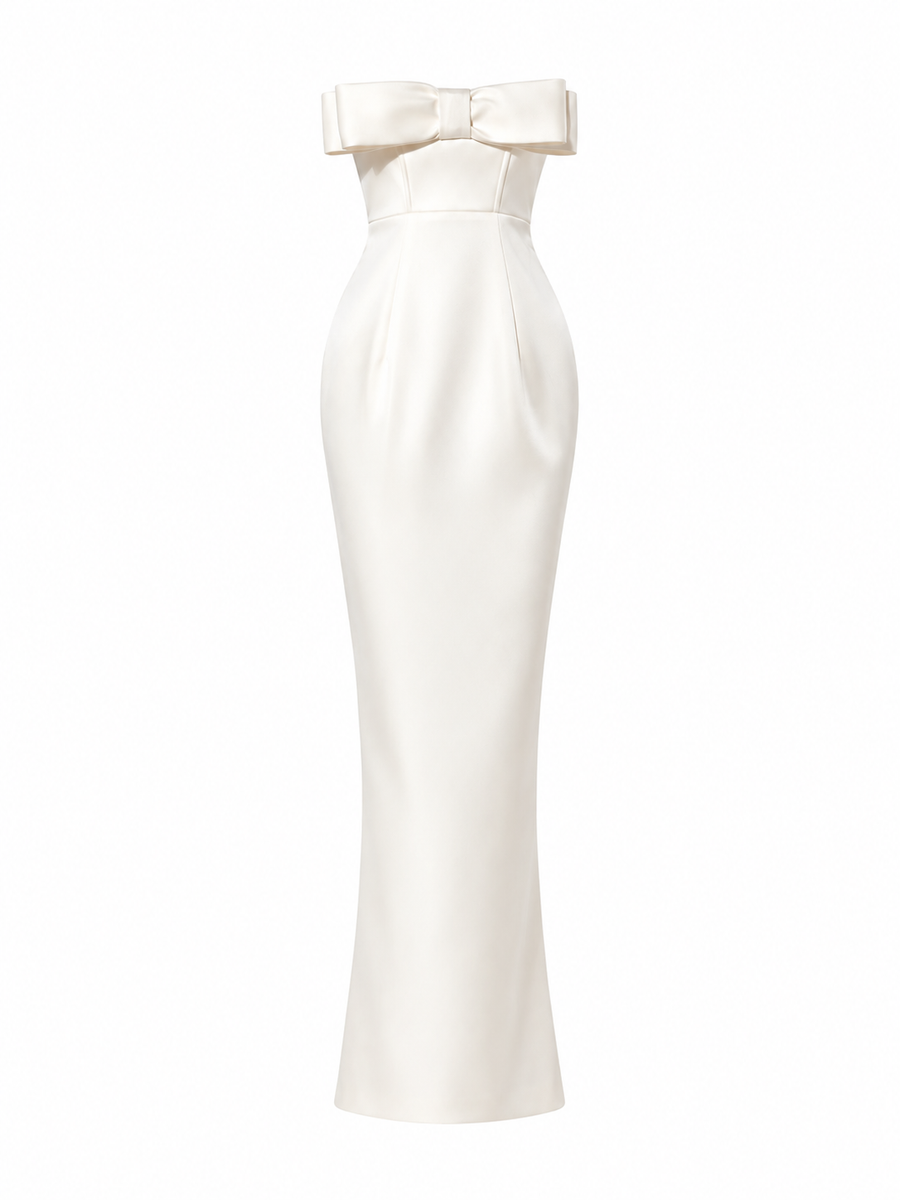 Ivory satin strapless evening gown with sculpted neckline and elegant bow detail