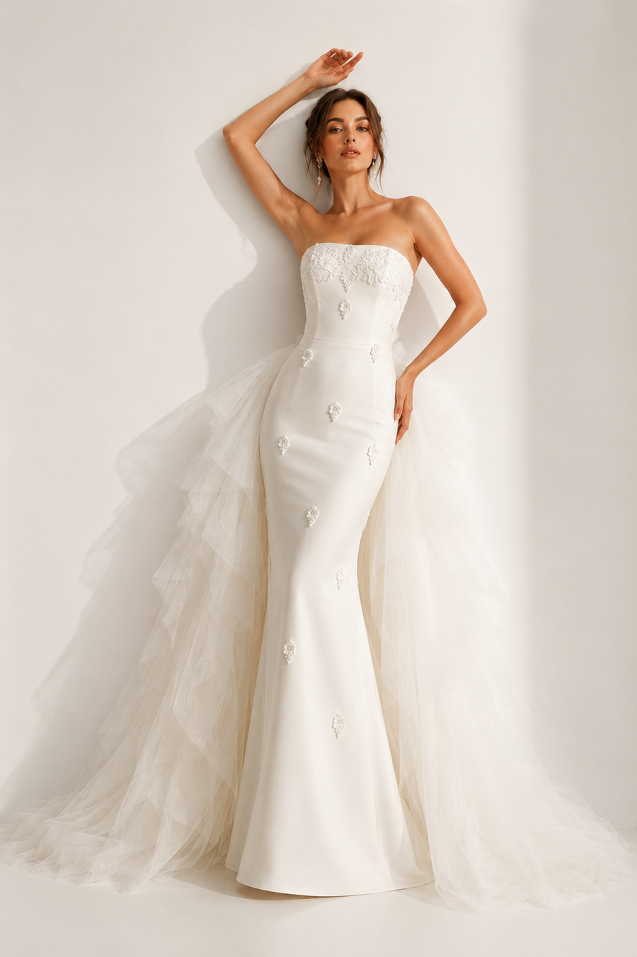 Ivory pearl satin formal wedding guest dress with sculpted floral appliqué and detachable tulle train