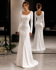 Ivory satin wedding guest dress with 3D floral appliqué and long sleeves