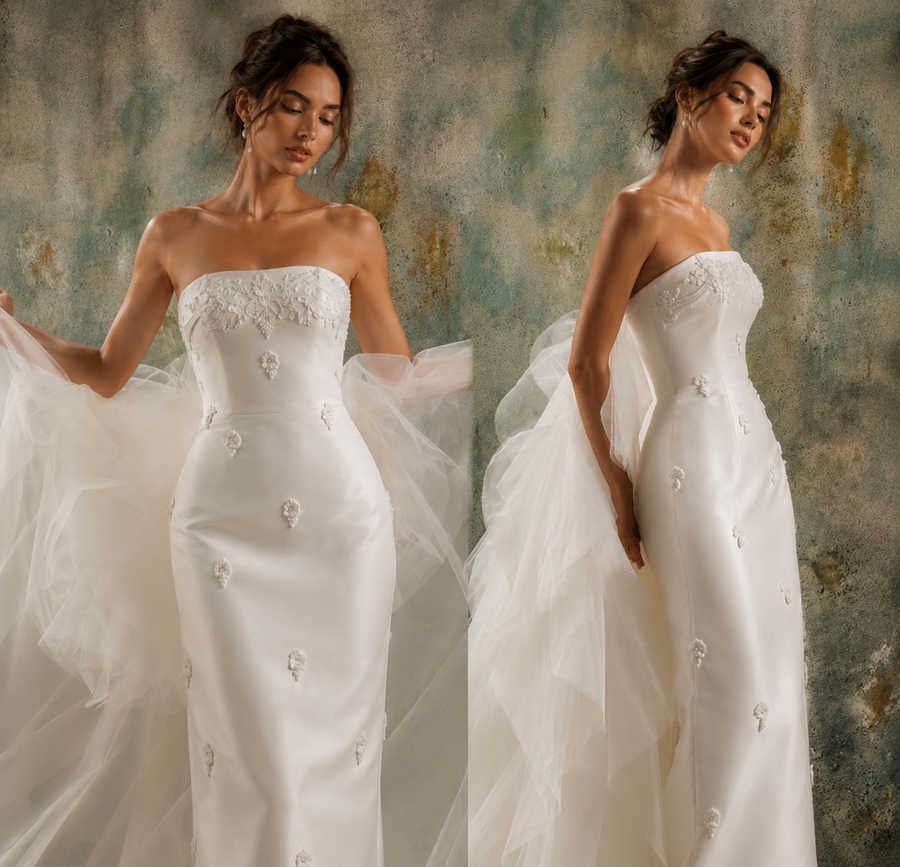 Ivory pearl satin wedding dress with floral appliqué and detachable tulle train in elegant sculpted silhouette