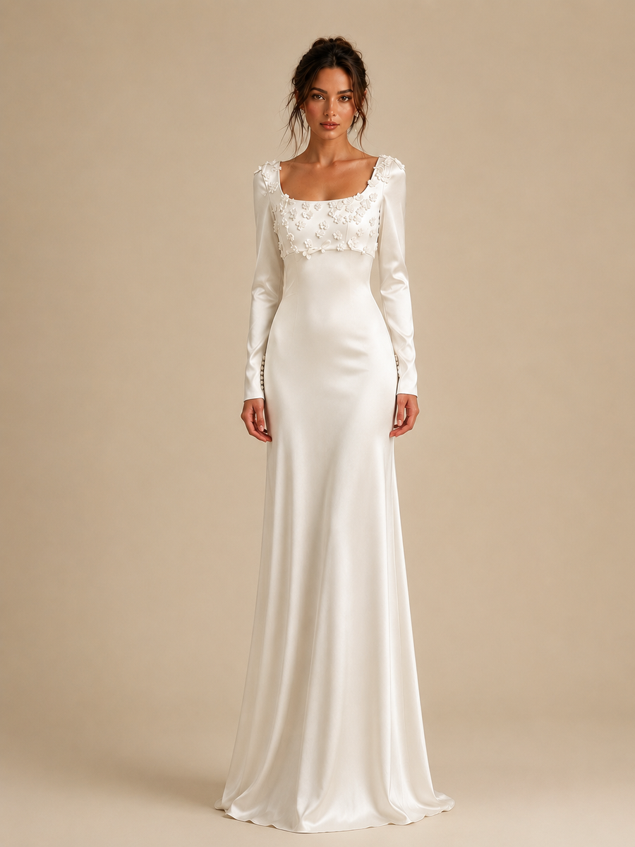 Ivory satin wedding guest dress with floral appliqué and long sleeves